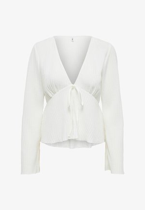 Witte blouse met lange mouwen, een diepe V-hals en striksluiting. Gemaakt van textuurstof met een subtiel geribbeld patroon.