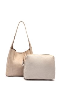 Beige nahkalaukku, jossa on yksi olkahihna ja rento muotoilu. Mukana irrotettava beige kangaspussukka, jossa on vetoketjusuljin.