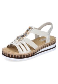 Sandalen met een metallic zilveren bovenkant, versierd met stenen, voorzien van brede elastische banden en een wigzool met kurk en gestreepte accenten.