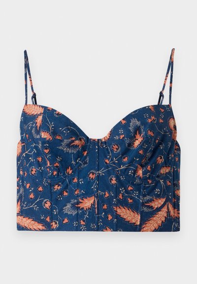 Navy blå crop-top med blomstermønster i oransje og rosa, med tynne justerbare stropper og strukturerte kopper. Myk stofftekstur.