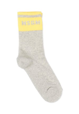 Chaussette grise unique avec une bordure jaune et le texte "MSGM" en gris sur la bordure, sur fond blanc.