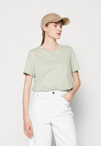 Calvin Klein MICRO jasnozielony
