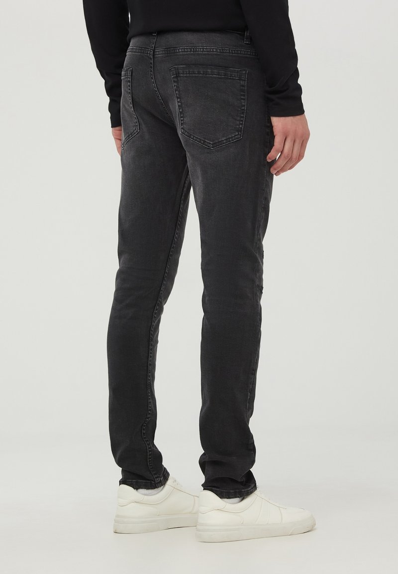 pantaloni strappati jeans kappa uomo strappati