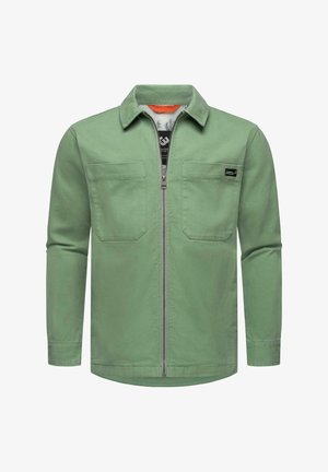 Giacca verde con zip frontale, maniche lunghe, due tasche sul petto e collo a camicia. Realizzata in tessuto liscio con una consistenza di peso medio.