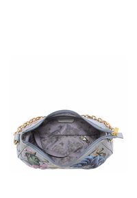 Hellblaue Handtasche mit floralen Muster, goldener Kettenriemen und Reißverschluss. Innenausstattung mit floralen gedruckten Futter und einer kleinen Tasche.