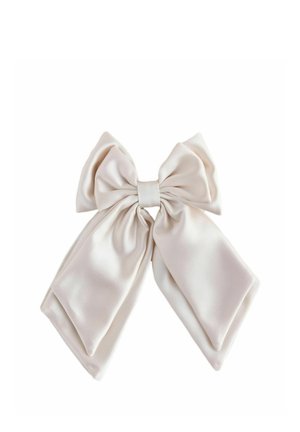 Large white satin bow with wide loops and long tails, neatly tied and centered on a plain white background.