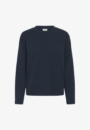 Chemise à manches longues bleu marine en coton doux, dotée d'un col rond, d'une coupe droite et d'un design minimaliste avec une texture lisse.