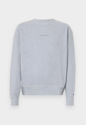 Svetlo šedá mikina z textúrovanej látky, s okrúhlym výstrihom, ribovanými manžetami a lemom. Na zadnej strane má jemné vyšívanie "tommy jeans".