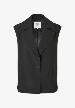 Mustmusteta vest, millel on sakiline krae, kaks esist pocketit ja üks nööbi sulgemine. Omab siledat kangast ja vooderdatud interjöör.