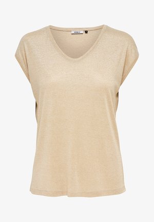 Haut beige à col en V et manches courtes, fabriqué dans un tissu doux et texturé avec un léger éclat. Coupe ample, avec une étiquette au niveau du col.