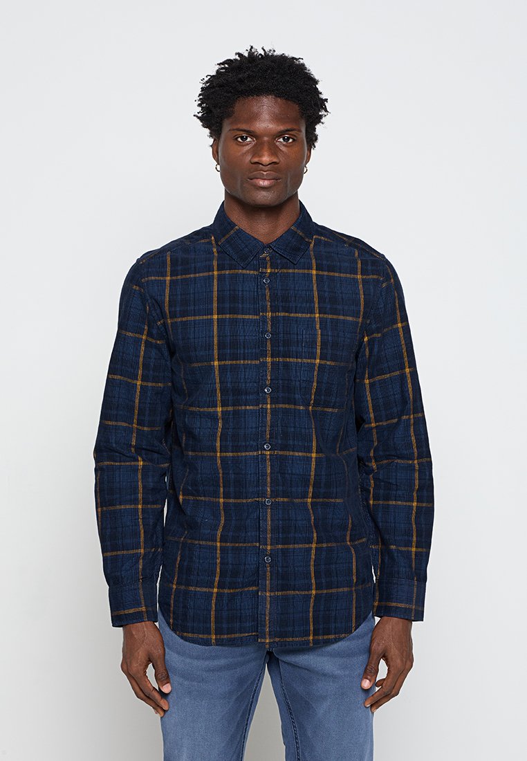 Camisa