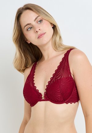 Bralette in pizzo borgogna con bordi scallop, scollatura profonda e motivo floreale, dotato di un gancio in metallo color oro nella parte anteriore.