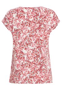 Valkoinen short-sleeve-pusero, jossa vaaleanpunainen, punainen ja musta kukkakuosi tasaisesti koko kankaalla.