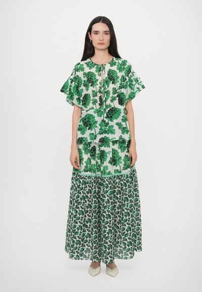 Maxi dress with green floral patterns on a white background, featuring a tie neckline, flutter sleeves, and a tiered skirt.