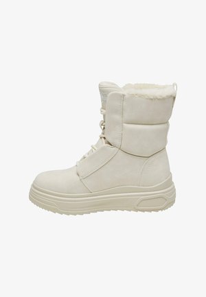 Beige-Ankle-Boot mit dickem, strukturiertem Sohlen, Kunstpelzfutter und Schnürung vorne. Wildledermaterial mit gepolsterter Knöcheleinfassung und dezentem Markenlogo.