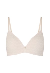 Soutien-gorge triangle beige doux avec un motif ondulé, des bretelles ajustables et un petit détail en métal doré au centre. Texture du tissu lisse.