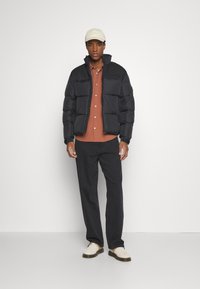 Tommy Hilfiger NEW YORK PUFFER JACKET - Giacca invernale - black