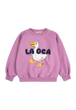 Sweatshirt lilas avec col rond et manches élastiques, arborant un graphique de canard cartoon et le texte "LA OCA" en lettres noires en gras.