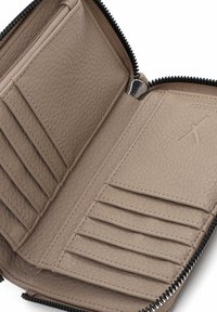 Beige leather wallet interior with multiple card slots and a zippered coin pocket. Textured finish, black zipper, and subtle branding present.