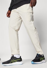 Ellesse Pantalones montañeros largos - beige