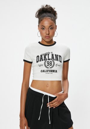 CROP  - Camiseta estampada - beige