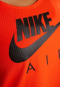 Nike Performance T-shirt imprimé - orange
