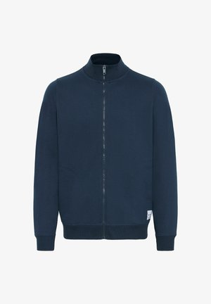 Tume tumesinine tõmblukuga sviiter kõrge kraega, kahe küljetasku ja ribadega varrukatega. Sile tekstuur ja minimalistlik disain.