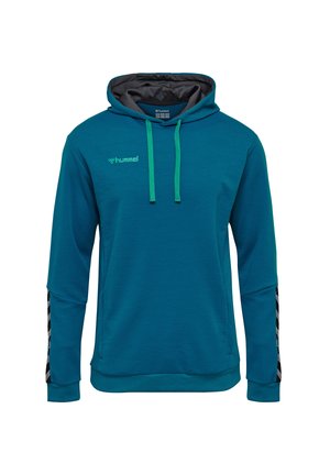 Teal hættebluse med tekstureret stof, kontrasterende grønne snore og sorte chevron-detaljer på ærmerne. Brandlogo på brystet.