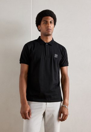 Antony Morato REGULAR FIT WITH LOGOED METAL BADGE ON RUBBER PATCH - Polo shirt - black