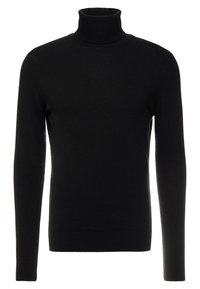 Svart polotröja i mjukt stickat material. Har långa ärmar samt ribbade muddar och fåll. Minimalistisk design utan mönster.