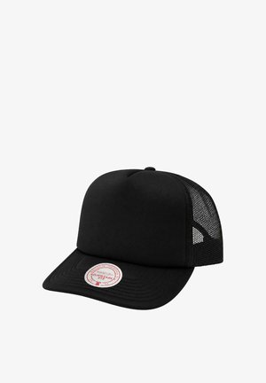 Black trucker cap with mesh back and curved brim, featuring a round white and red adjustable fit sticker on the front of the brim.