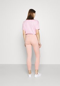 ONLY ONLBLUSH ANKRAW - Calças de ganga de corte skinny - misty rose