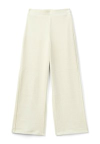 Kremowe szerokie spodnie wykonane z miękkiego materiału, charakteryzujące się wysokim stanem oraz prostym krojem, z widocznymi szwami wzdłuż krawędzi.