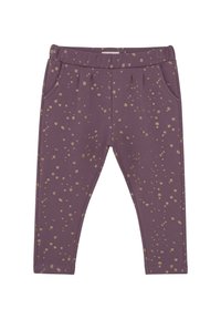 Lila Leggings aus weichem Stoff mit goldenen Punkten, elastischem Bund und seitlichen Taschen. Glatte Textur, schmal zulaufendes Design.