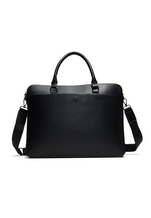 Serviette rectangulaire noire en cuir avec double poignée, bandoulière amovible et logo discret sur le devant, présentée sur fond blanc.