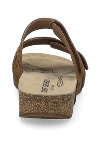 Brown leather sandals with multiple adjustable straps, a textured cork sole, and a contoured footbed. Features perforated detailing on the sides.