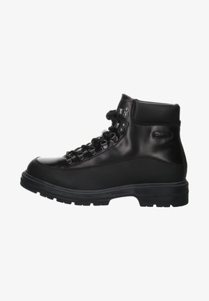 Black leather hiking boots with a high ankle, rubber sole, metal eyelets, and lace-up closure. Smooth texture with a matte finish.