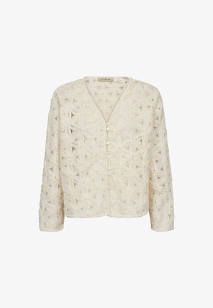 Kremo spalvos ilgomis rankovėmis palaidinė su V formos iškirpte, priekyje perlų mygtukai ir tekstūruotas gėlėmis dekoruotas audinys.