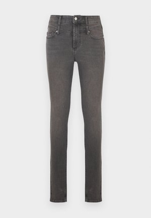 Skinny jeans in dark gray denim with a classic five-pocket design, featuring a button closure and subtle fading near the hips.