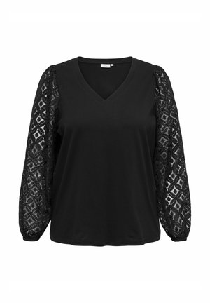 Črn top z V-izrezom in dolgimi rokavi, izdelanimi iz zapleteno vzorčastega čipke. Telo je izdelano iz enobarvnega, gladkega blaga.