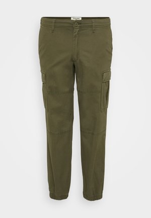 Olive green cargo pants made of cotton, featuring side pockets, elastic cuffs, and a flat front with a zip fly and button closure.