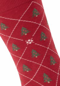 Czerwone bawełniane skarpetki z wzorem diamentowym i zielonymi choinkami bożonarodzeniowymi oraz białymi konturami. Miękka tekstura, idealne na świąteczne okazje.