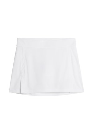 Valkoinen hame, jossa on tasainen pinta, litteä vyötärö ja hienovaraiset poimut sivuilla. Yksinkertainen malli, polvimittainen.