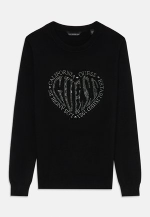Sweater preto com gola redonda, apresentando um design de strass prateados em forma de coração que inclui o nome da marca "GUESS" e detalhes em texto.