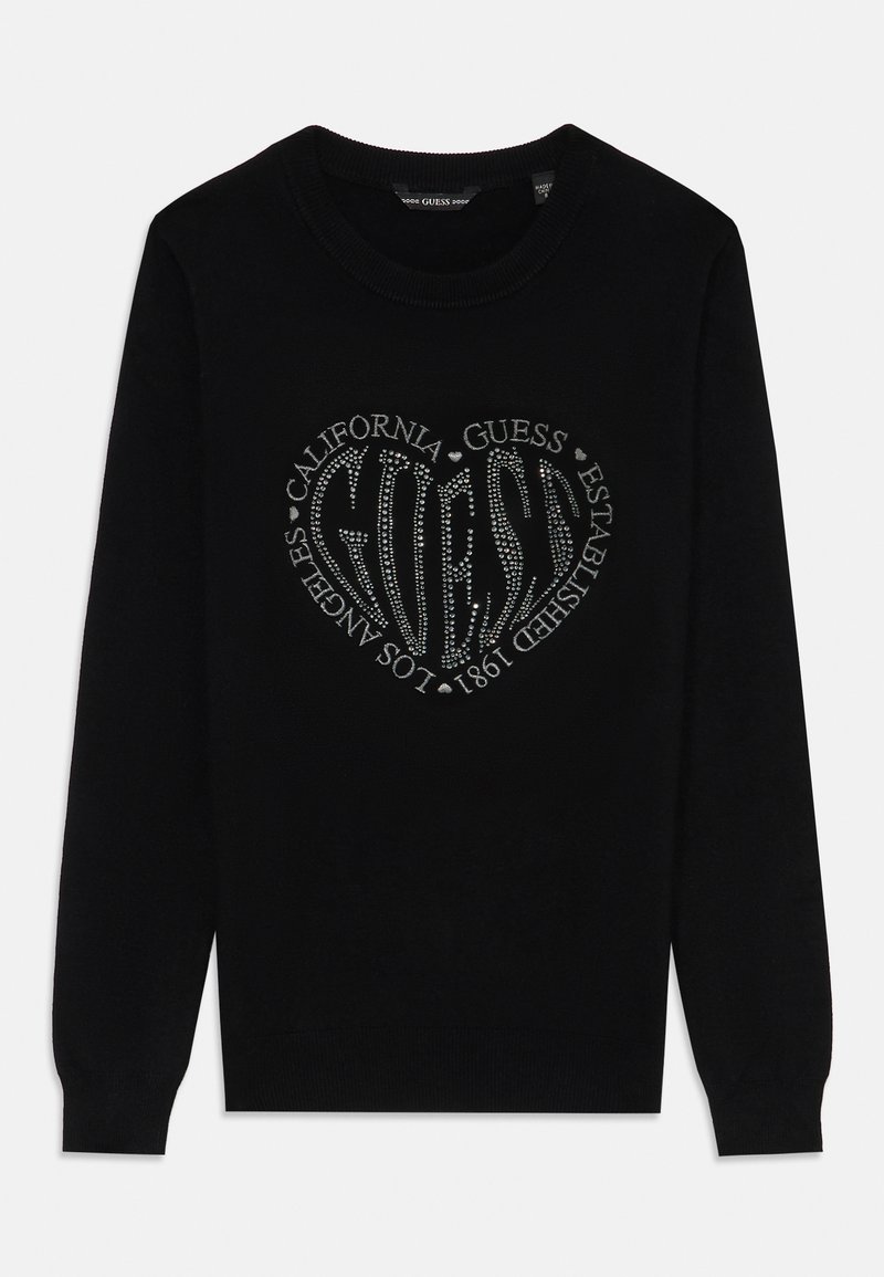 Maglione nero con scollatura rotonda, caratterizzato da un design di strass argentati a forma di cuore che include il nome del marchio "GUESS" e dettagli testuali.