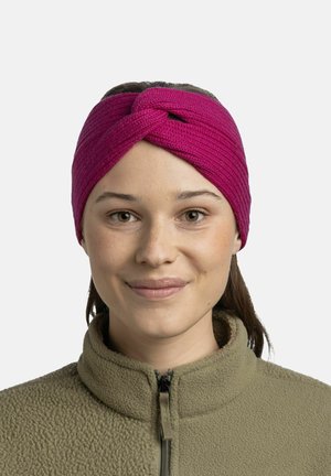 Knitted pink headband with a twisted design; worn with a beige zip-up fleece jacket. Smooth texture and snug fit.