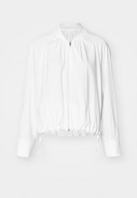 White, lightweight bomber jacket with a zip front, elasticized hem, and cuffs. Features a gathered design at shoulders and adjustable drawstrings.