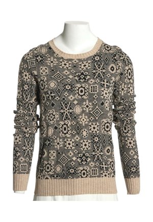 Pull en maille à manches longues avec motifs géométriques et floraux beige et noir, poignets et ourlet côtelés, présenté sur un mannequin sans tête.
