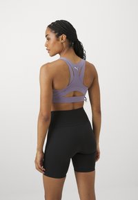 Puma SHAPELUXE  - Sujetadores deportivos con sujeción alta - pale plum