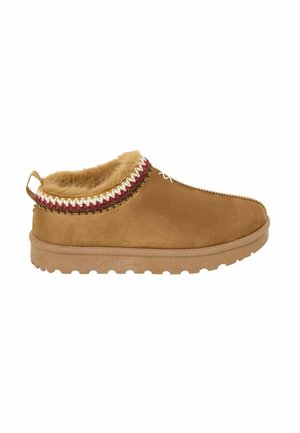 Tan suede slipper with faux fur lining, braided red and white accent, and a textured light brown sole featuring small grip patterns.